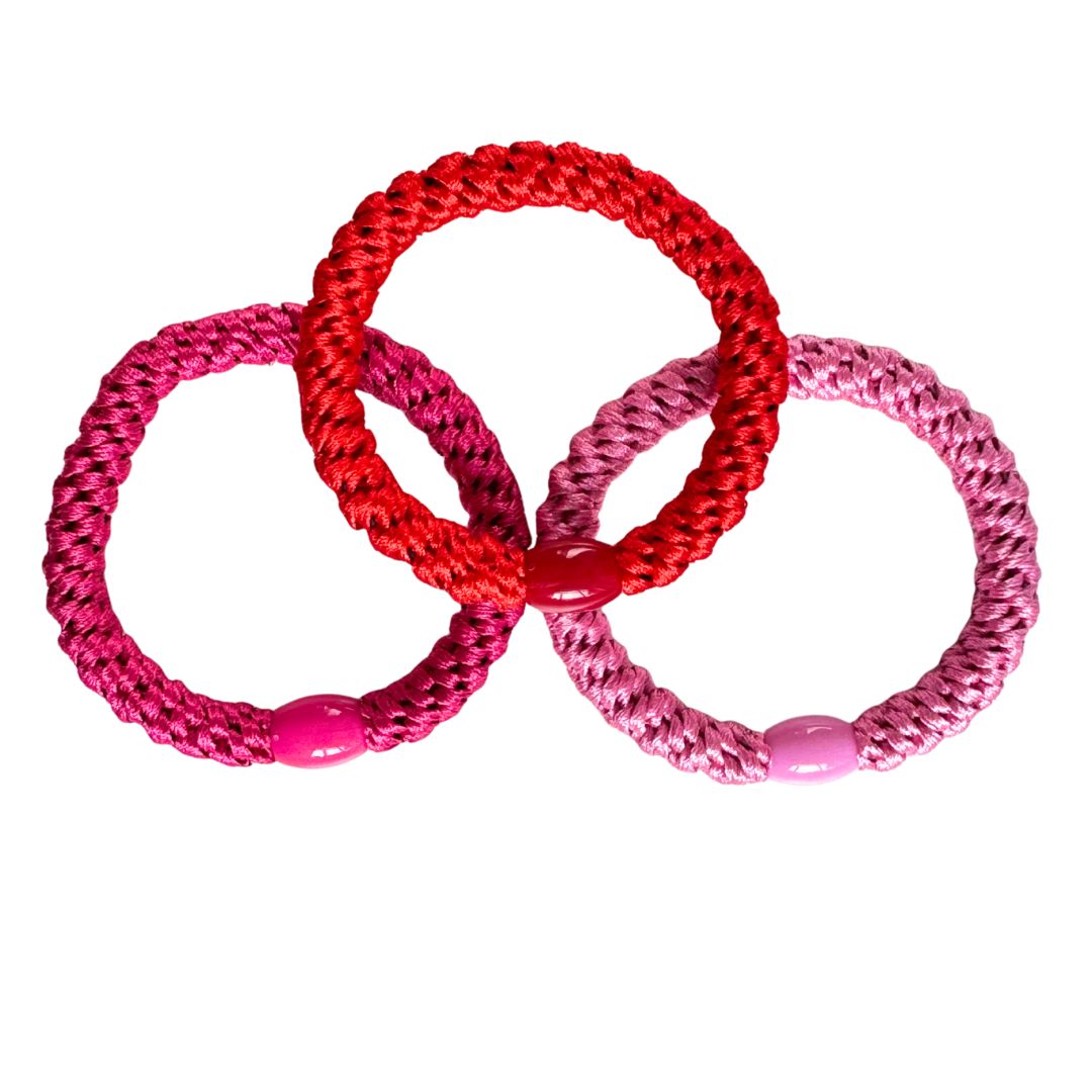 Geflochtenes Haargummi im 3er Set in Rot / Rosa / Fuchsia
