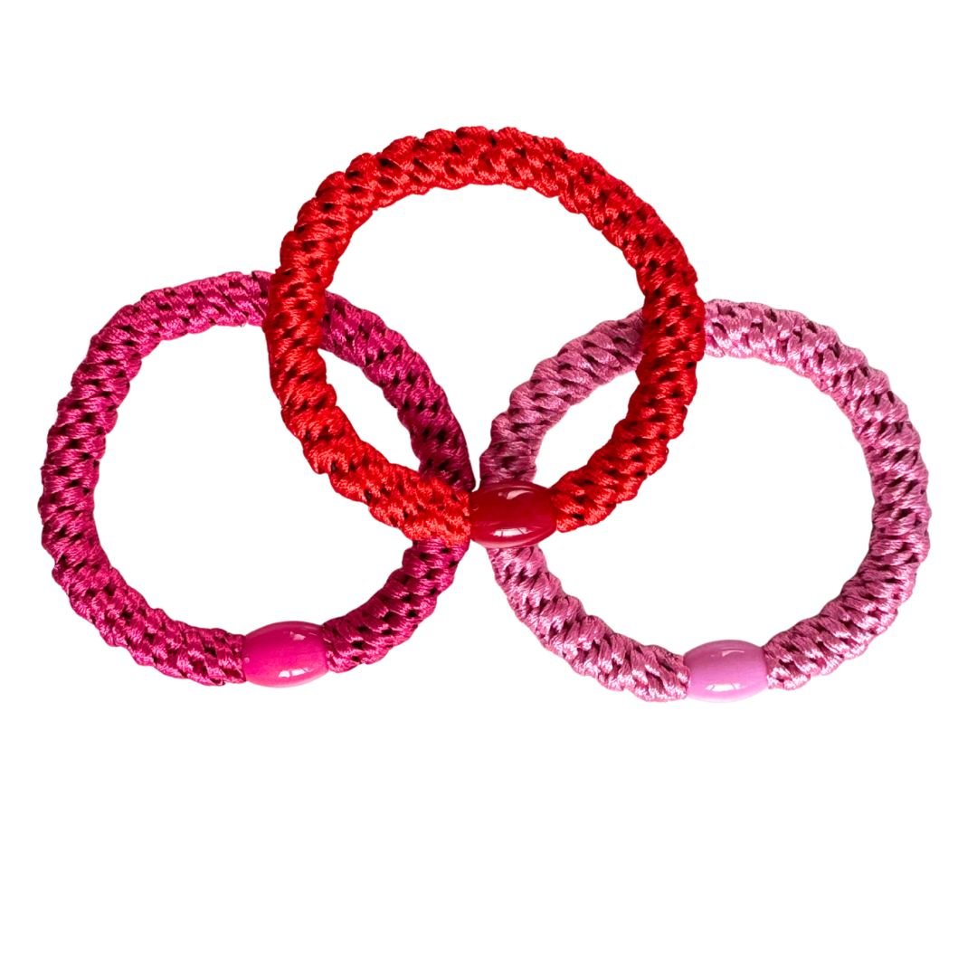Geflochtenes Haargummi im 3er Set in Rot / Rosa / Fuchsia