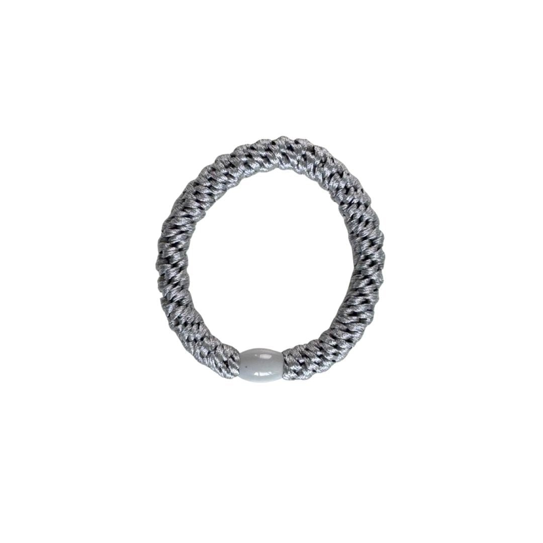 Braided hair ties in a set of 3 in light blue, gray, gray and gold stripes