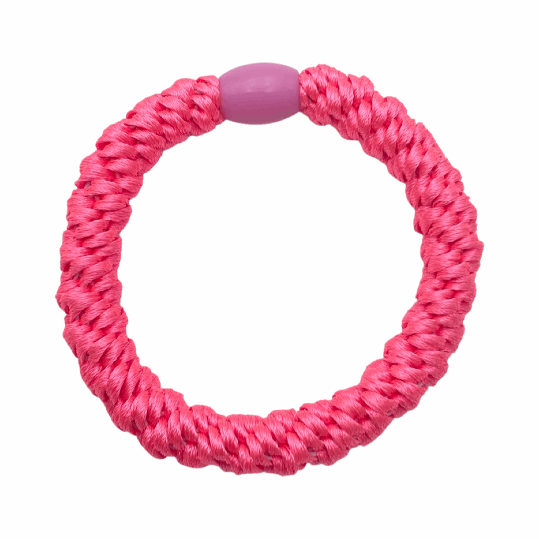 Geflochtenes Haargummi Pink und geflochtenes Armband von Pizzicato