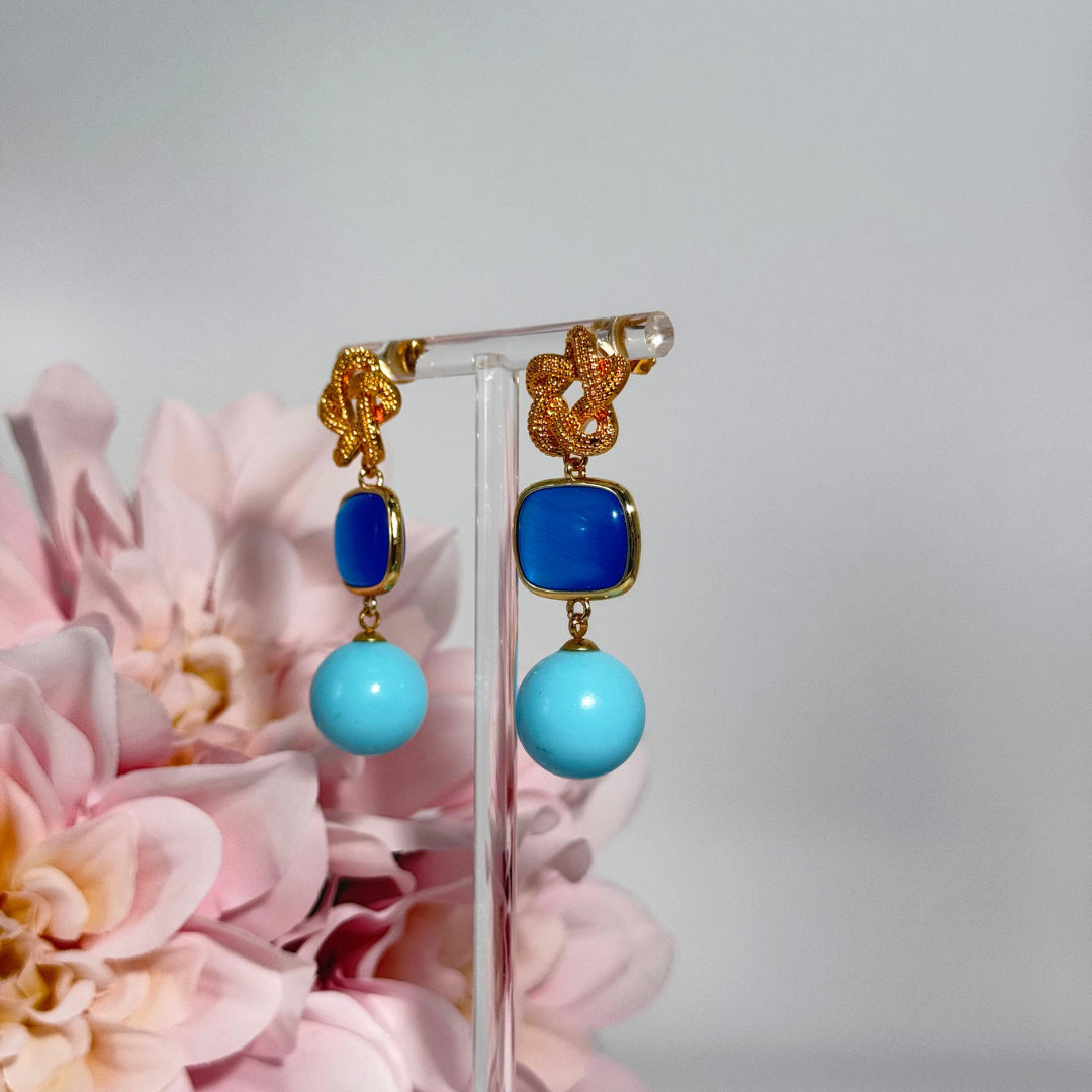 Eternity Turquoise Blue mit quadratischem Katzenaugen-Anhänger und Pastenperle

